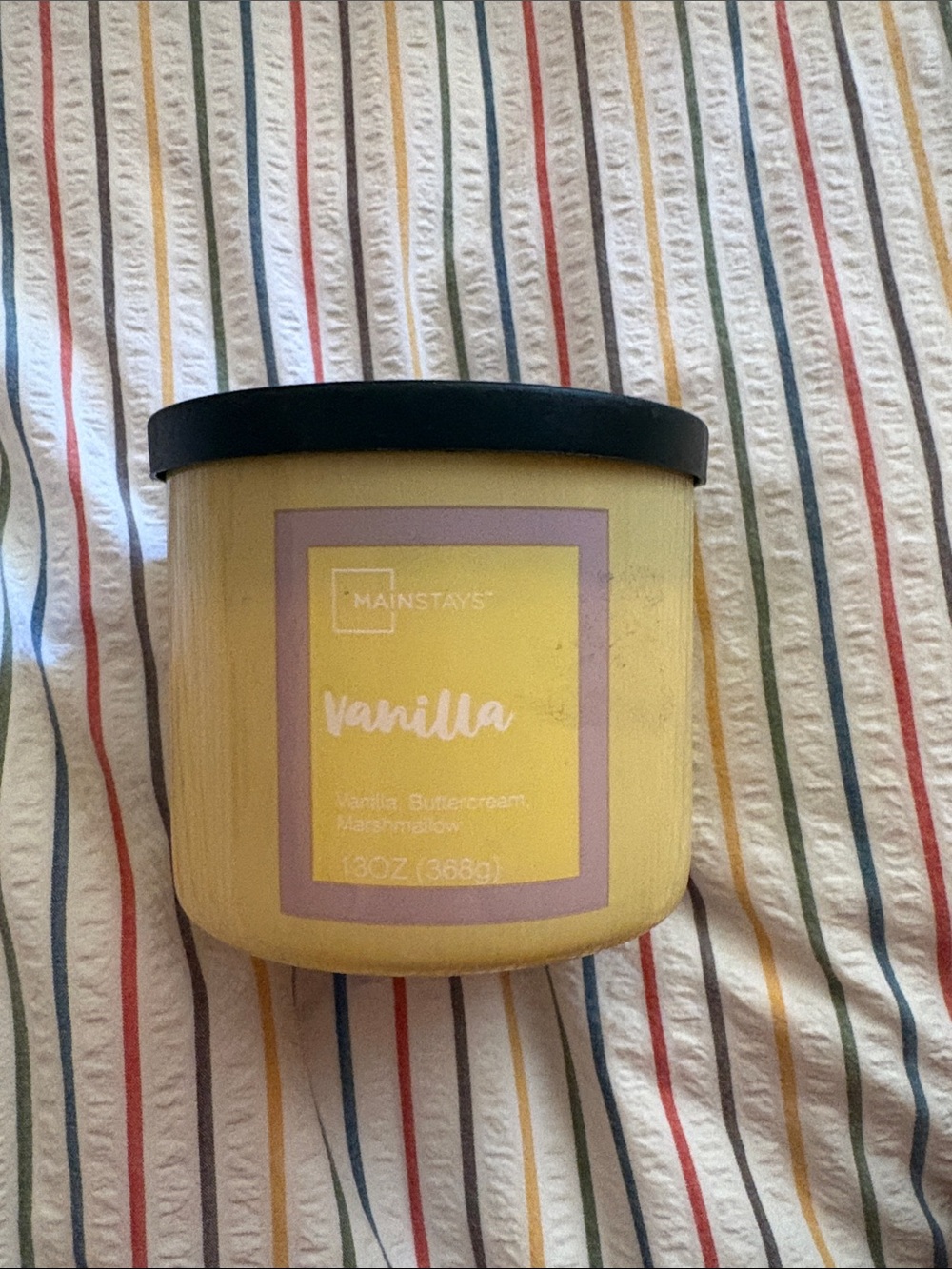 Mainstays Vanilla Candle in Yellow with Black Lid